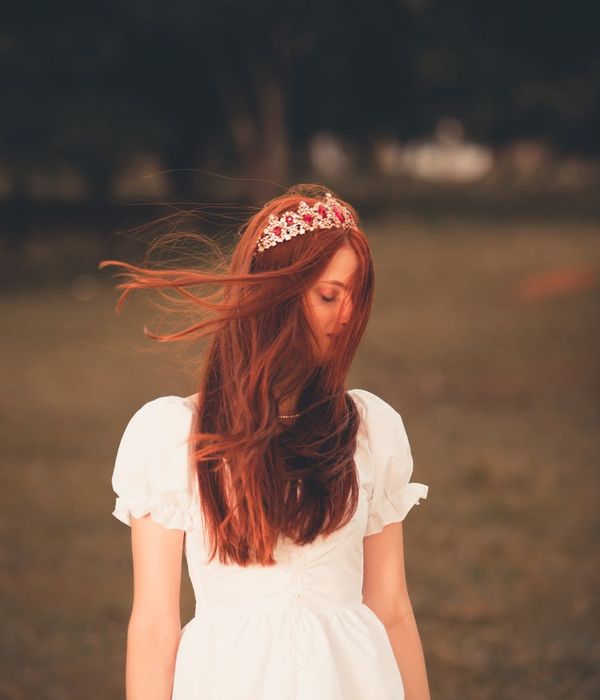 Woman performing a gentle cardio movement in a calm, focused environment.